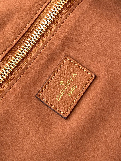 lv neverfull mm 32 brown monogram empreinte leather - image 8