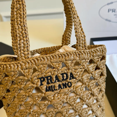 CROCHET BUCKET BAG 32 IN BROWN WOVEN RAFFIA EMBROIDED LOGO
