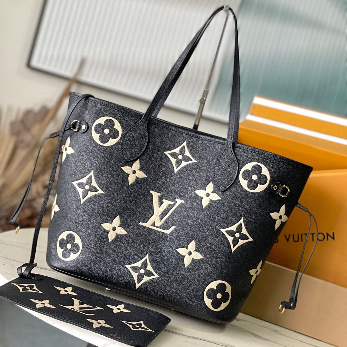 lv neverfull mm in black cream monogram empreinte leather - main image