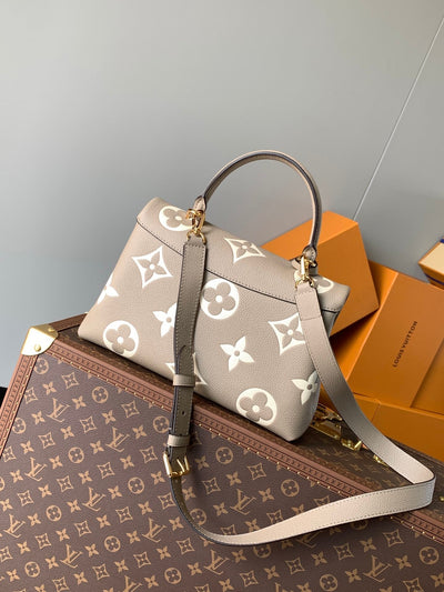 lv madeleine 30 in beige monogram calfskin embossed logo - image 4