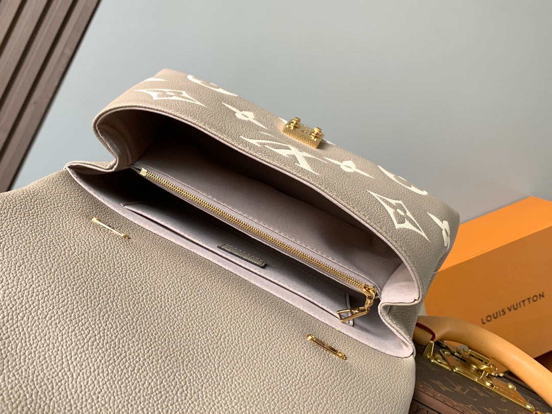 lv madeleine 30 in beige monogram calfskin embossed logo - image 5