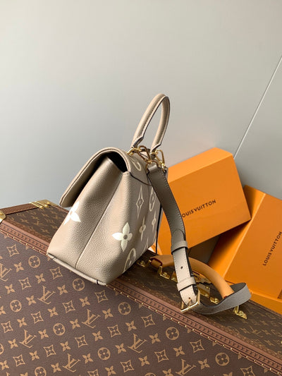 lv madeleine 30 in beige monogram calfskin embossed logo - image 7