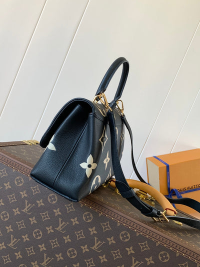 lv madeleine 30 in black mix white monogram calfskin embossed logo - image 3