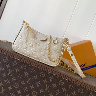 lv easy pouch on strap 19 in beige monogram empreinte leather - main image